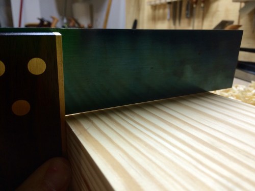 Checking for squareness of the edge using the face as a reference