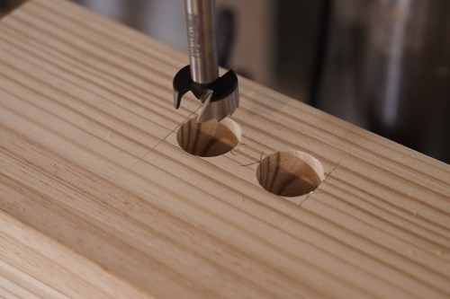 Boring the waste with a forstner bit